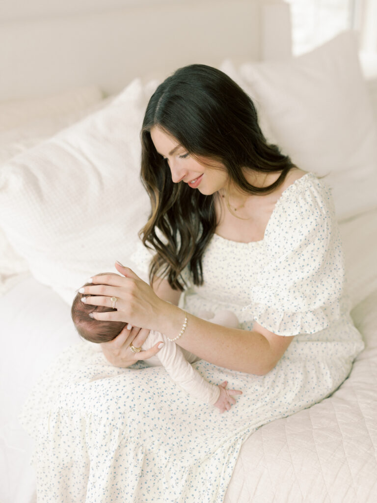 Photo of mom and baby taken by College Station Newborn Photographer, Meg Staheli Photo.