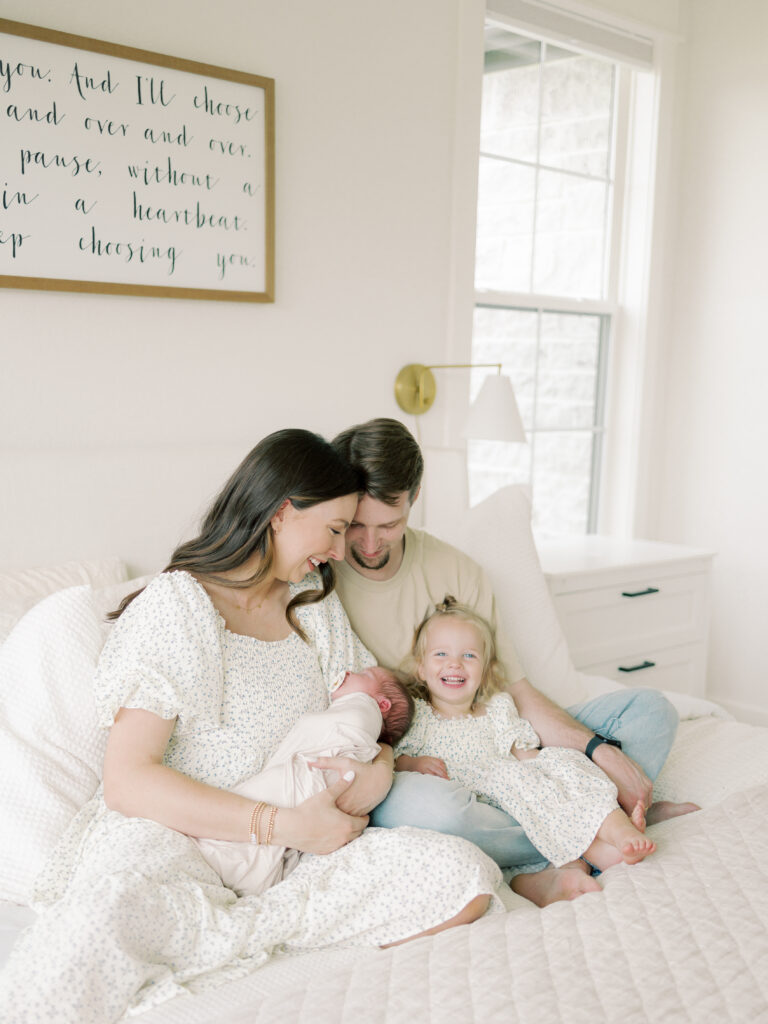 Photo of beautiful family taken by College Station Newborn Photographer, Meg Staheli Photo.