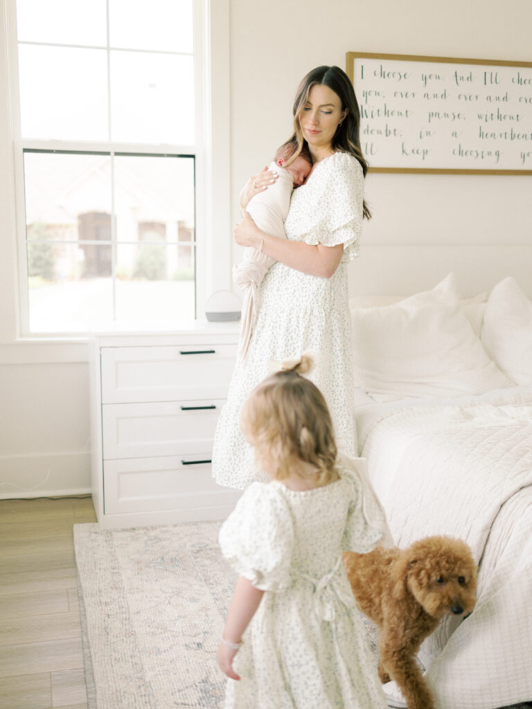 Photo of mom, toddler, and baby taken by College Station Newborn Photographer, Meg Staheli Photo.